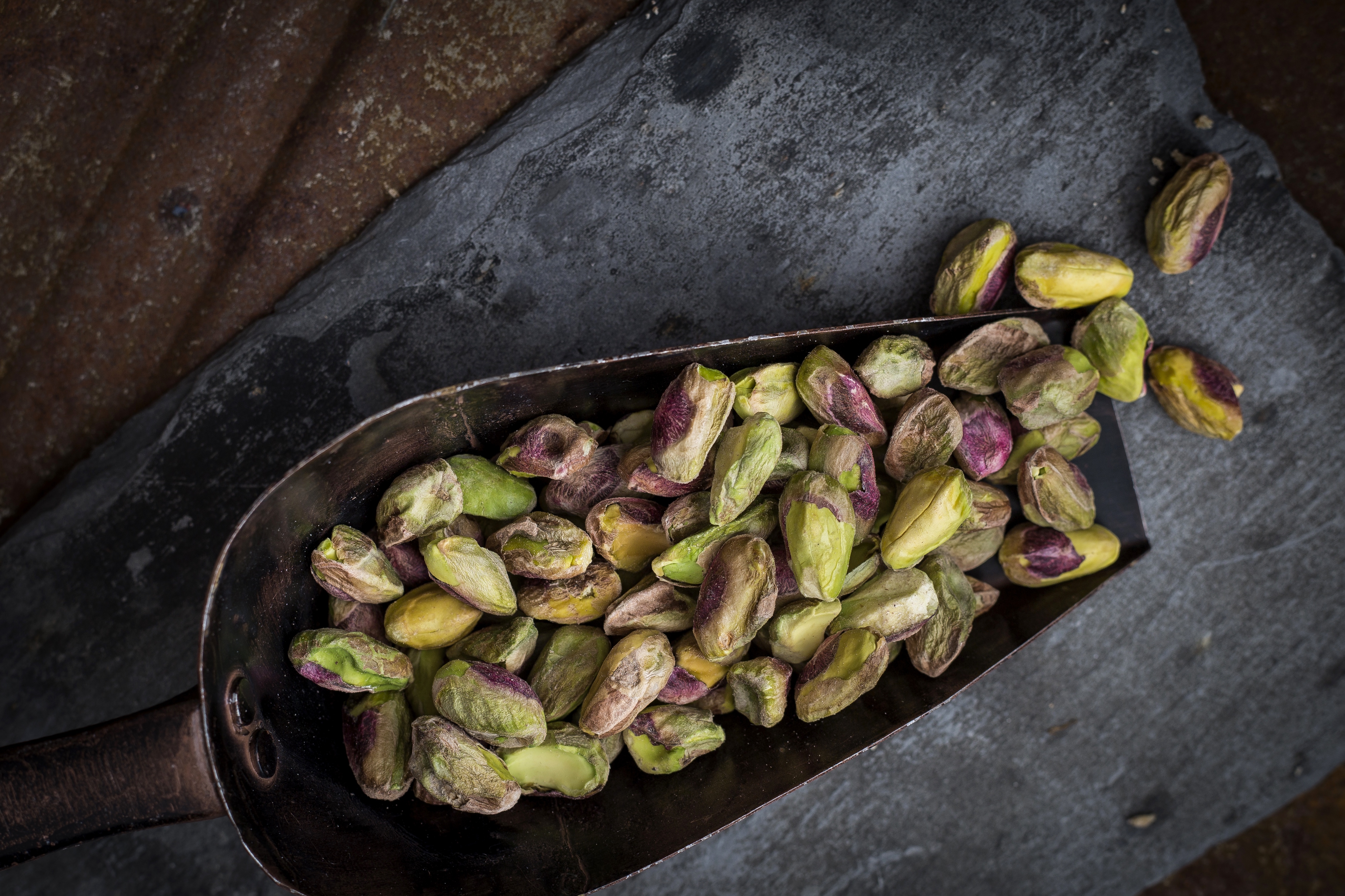 Profiteroles with pistachios balsamic vinegar chocolate rose