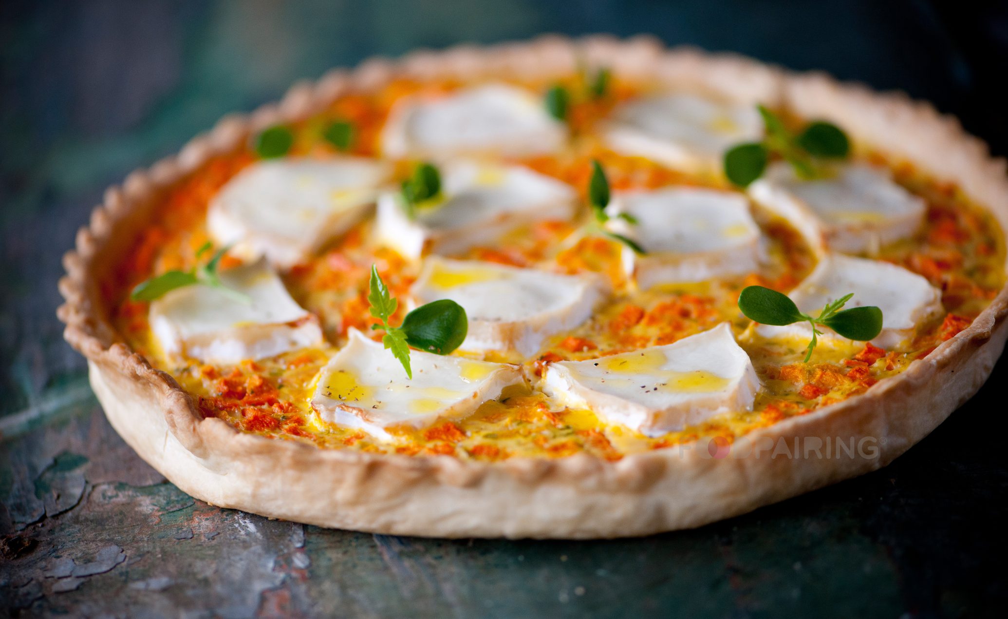 Quiche with pumpkin tarragon yoghurt goat cheese tahoon cress